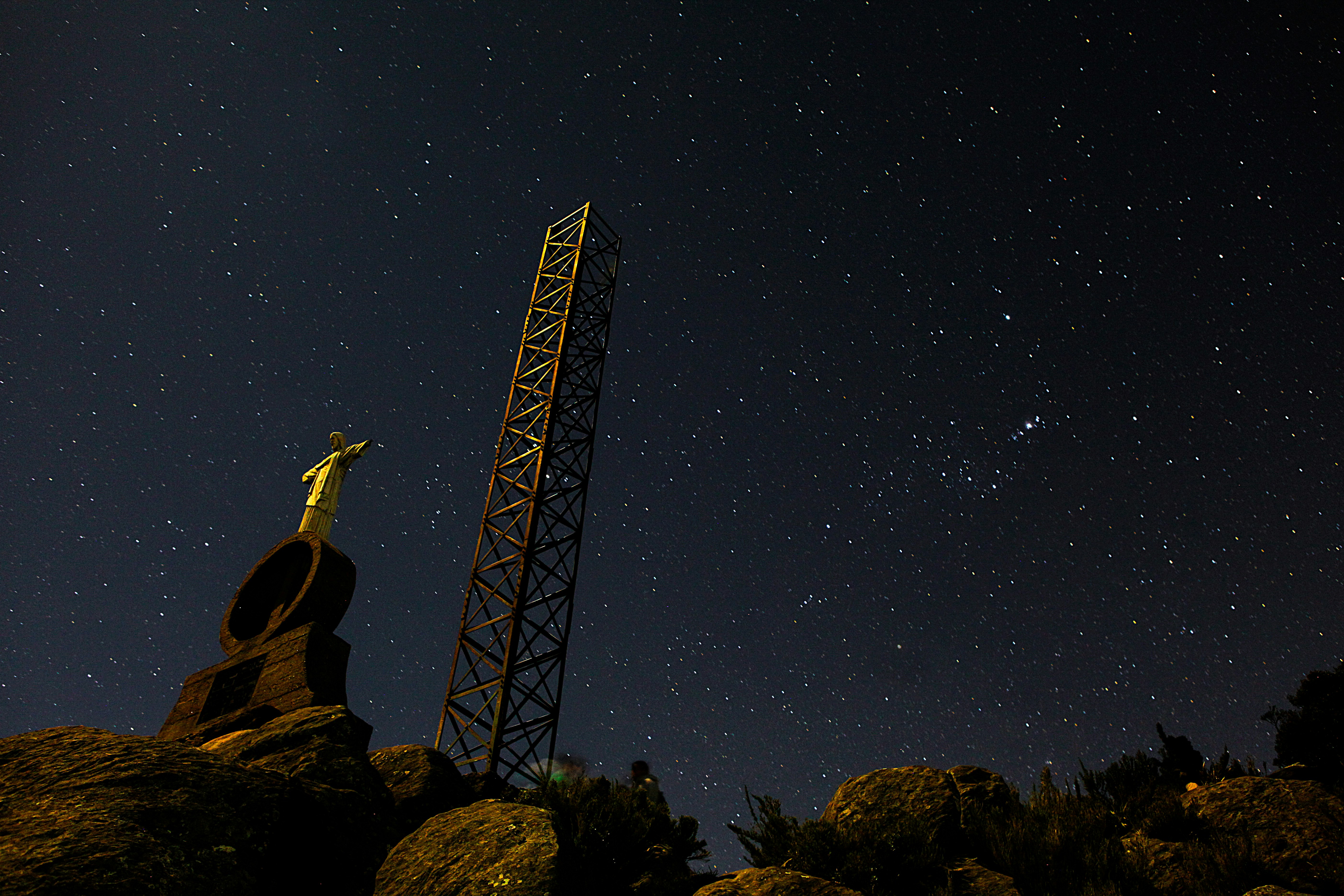 black tower under black sky